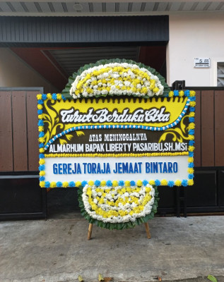 Papan Bunga Duka di Kairagi Satu